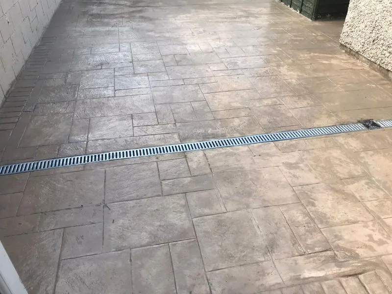 Drainage channel beside paved surface in Dublin