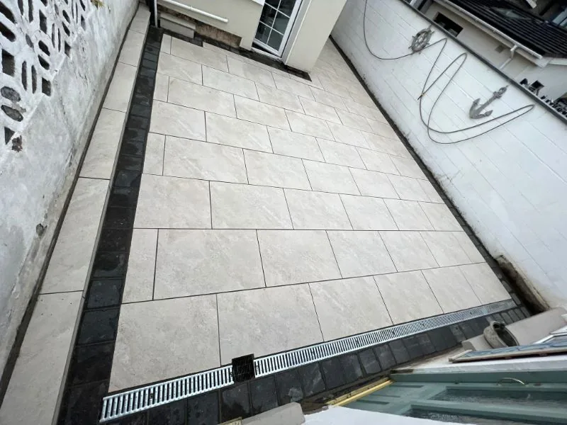 Porcelain patio transition between paved and garden areas in Dublin